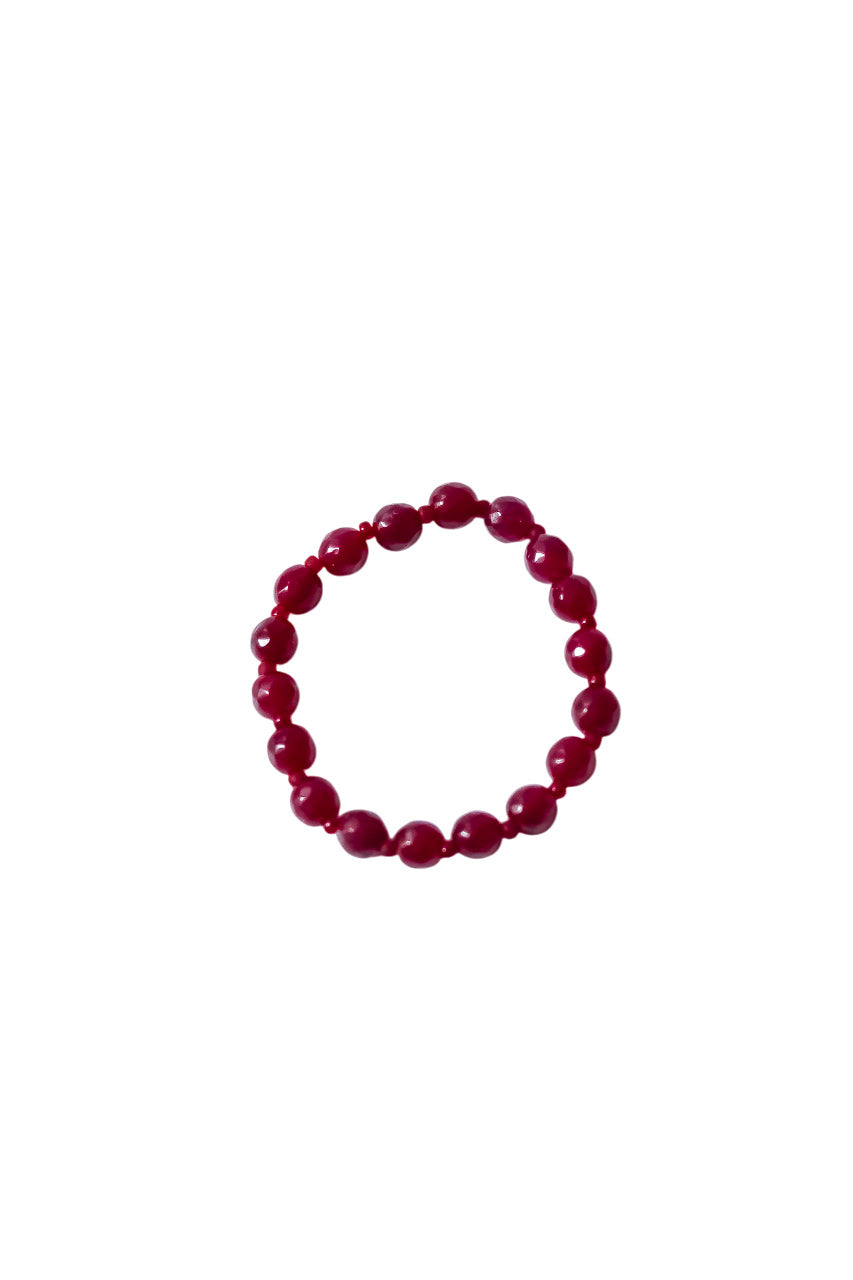 Red bracelet with natural glass beads on elastic