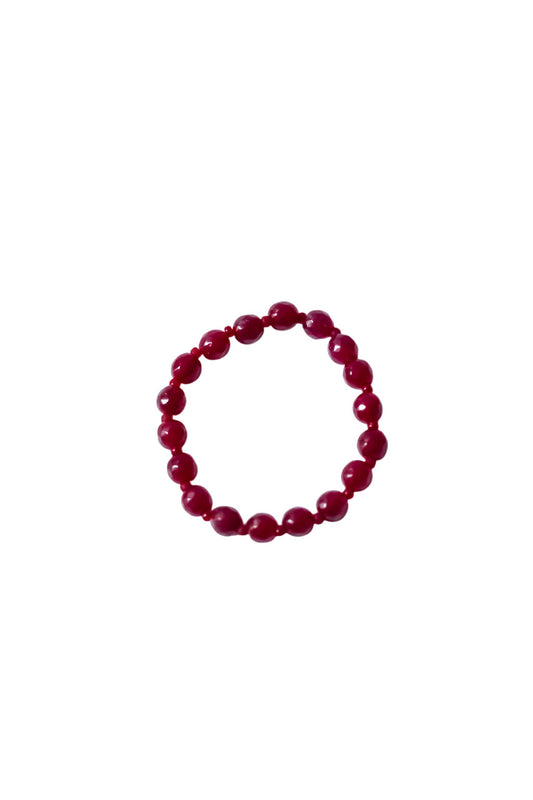 Red bracelet with natural glass beads on elastic