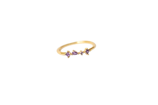 Golden ring band with gemstones