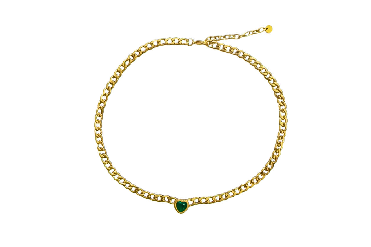Golden tennis necklace with green heart